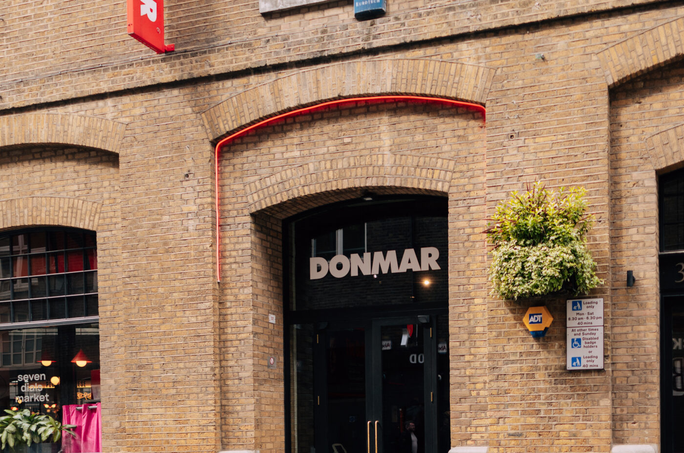 The Donmar Warehouse theatre building in London’s West End, Covent Garden area. One Aldwych theatre partner.