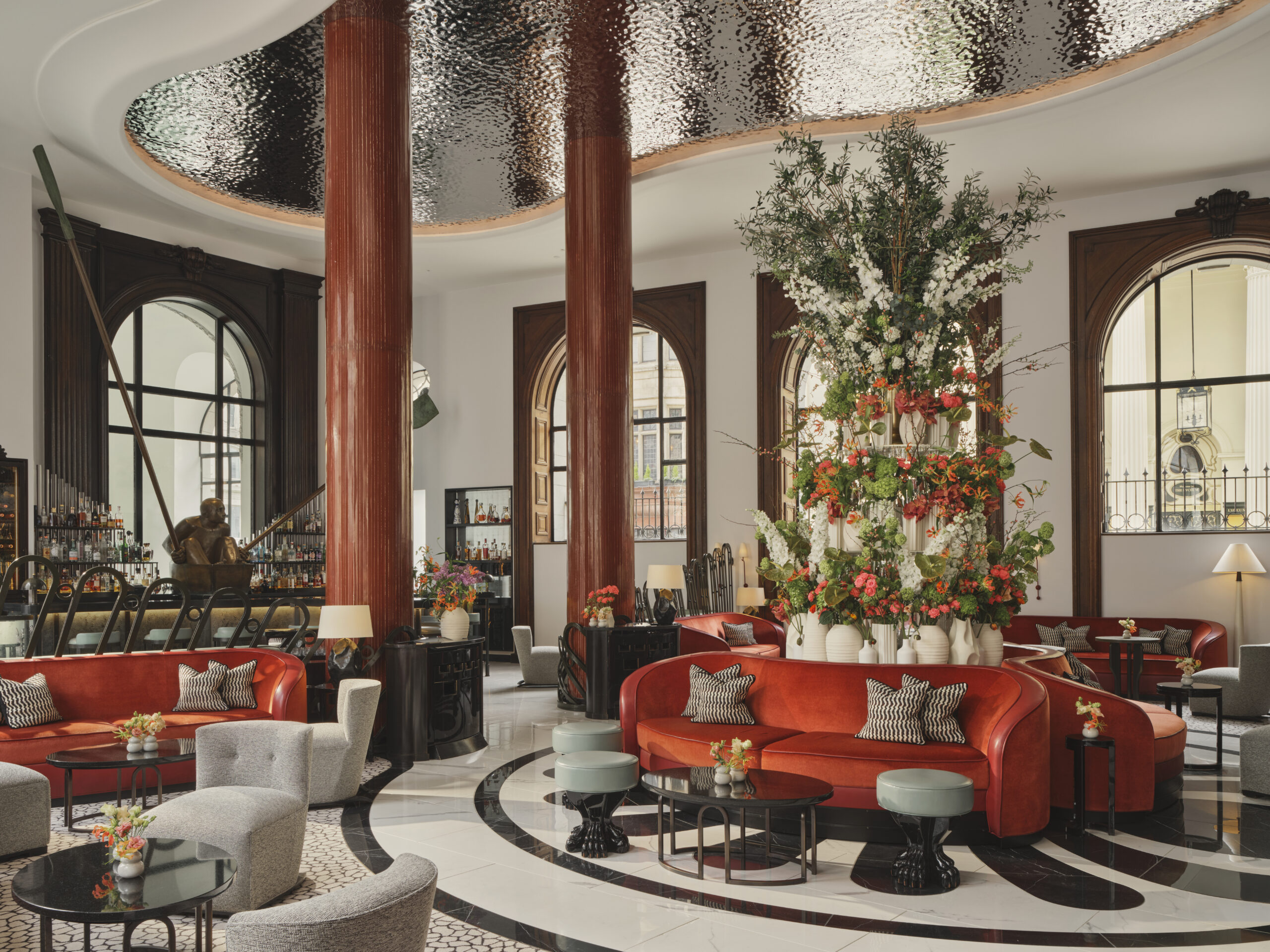 Elegant interior of the Lobby Bar at One Aldwych in Covent Garden, London, featuring contemporary design, comfortable seating and a stylish atmosphere.